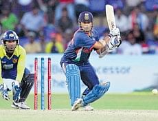 Sachin Tendulkasr sets himself up for a reverse sweep against Ajantha Mendis during his 44th one-day century in the tri-series final in Colombo. AP