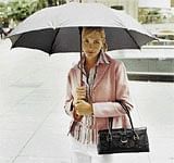 Rain Wear: Treat the umbrella as a fashion accessory. It should be tall enough to reach your waist.