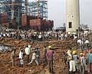 Rescue men at the site of collapsed chimney at Korba, in Chhatisgarh, on Wednesday. AP