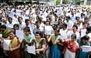 WE QUIT: Doctors protest with their resignation letters, demanding that the government increase their pay, at Anand Rao Circle in Bangalore on Tuesday