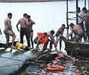 Rescue operation in progress after a boat mishap at a tourist spot at Thekkady in Kerala on Wednesday. PTI