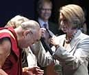 House Speaker Nancy Pelosi presents The Dalai Lama with the first Lantos Human Rights Prize, on Tuesday,on Capitol Hill in Washinton. AP