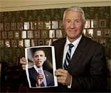 Chairperson of the Norwegian Nobel Committee, Thorbjorn Jagland, with picture of Nobel Peace Prize laureate 2009 Barack Obama in Oslo, Friday. AP
