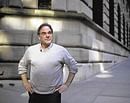Oliver Stone outside the Federal Reserve Bank building in New York.