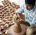 Lamps being made for the upcoming Diwali  festival at Pottery Town in Bangalore on Friday. DH Photo