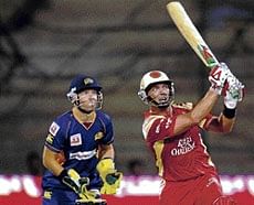 Jacques Kallis masterminded the Royal Challengers entry into League Phase with a commanding all-round performance, Monday. Dh Photo/Srikanta Sharma R