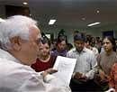 Union HRD Minister Kapil Sibal reads out his statement on the move to change the elegibility criteria for IITs, at his office in New Delhi on Tuesday.