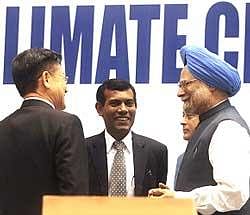 PM Manmohan Singh and Maldives President Mohamed Nasheed(c) attend an international conference on technology and climate change in New Delhi . AFP