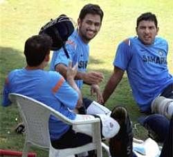 Indian Captain M S Dhoni and Yuvraj Singh during a practice session on the eve of the first ODI of India-Australia series in Vadodara Saturday. PTI