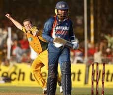 Australian bowler Peter Siddle celebrates after dismising Harbhajan Singh