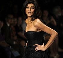 Indian actress Susmita Sen presents a creation by Indian designer Sanjana Jon during the Wills India Fashion Week (WIFW)