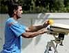 Skipper M S Dhoni at the bowling machine during a practice session at VCA Stadium in Nagpur on Tuesday. PTI