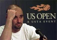 In this Sept. 2, 1997 file picture Andre Agassi during a  press meet following his lost match against Australia's Patrick Rafter at the US Open. AP