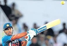 MS Dhoni executes a pull en route to his hundred against Australia in the second one-dayer at Nagpur on Wednesday. AFP