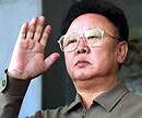 North Korean leader Kim Jong-il returns a salute as he reviews a military parade in Pyongyang. File photo/ Reuters