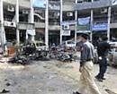 Policemen secure the site after the sucide bomb blast in Rawalpindi on Monday. AFP