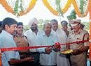 MLA Yogish Bhat inaugurating Kadri fire service station building in Mangalore on Monday. IGP (Western range) Gopal Hosur, DC V Ponnuraj and others