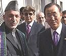 Afghan President Hamid Karzai with U.N. Secretary-General Ban Ki-moon in Kabul on Monday. AP