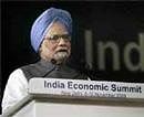Prime Minister Manmohan Singh addresses the audience at the India Economic Summit in New Delhi on Sunday. PTI