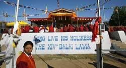 Dalai Lama greets people upon his arrival at Tawang monastery,  in Arunachal Pradesh on Sunday. AFP
