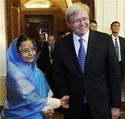 Indian President Pratibha Patil, left, receives Australian Prime Minister Kevin Rudd at the Presidential Palace in New Delhi on Thursday, PTI
