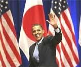 US President Barack Obama waves after delivering his speech at Suntory Hall on Saturday. AP