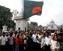 Bangladeshis celebrate after the verdict outside the Supreme Court in Dhaka on Thursday. AFP