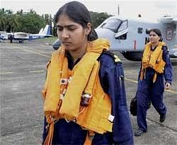 Sub Lieutenants Seema Rani Sarma and Ambica Hooda, who will be inducted on November 20 as the Navy's first airborne tacticians, after their standardisation test at Kochi Naval Base on Wednesday. PTI