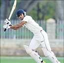 Tiwary's fifty saves Bengal