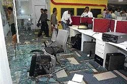 The scene at the office of IBN-Lokmat after it was allegedly attacked by Shiv Sena activists in Mumbai on Friday. PTI