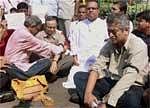 IBN Editor-in-Chief Rajdeep Sardesai and IBN Lokmat Editor Nikhil Wagle sit on dharna along with other journalists at Hutatma Chowk in Mumbai on Saturday to protest against the attack on the office of IBN Lokmat by Shiv Saniks. PTI