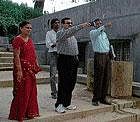 Youth Services and Sports department Secretary I M Vittalamurthy inspecting the work on stadium at Mans Compound in Madikeri on Saturday. Sports department Assistant Director Gayathri, Land Army Corporation Assistant Director Panduranga are seen. DH photo