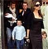 File Photo of Victoria Beckham leadsingsons Brooklyn (to her right), Romeo (left) while David Beckham carries Cruz.