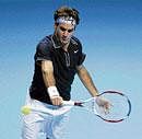 In control Roger Federer fires a backhand winner against Fernando Verdasco in London on Sunday. AFP