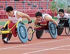 FOLLOW THE LEADER: Chinese athletes train ahead of the IWAS Games at the Sree Kanteerava stadium on Monday. DH PHOTO/