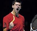 War cry Novak Djokovic of Serbia celebrates his win over Russias Nikolay Davydenko in London on Monday. AFP