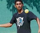 poised to strike Karnatakas K Prateesh essays a forehand in his victory over Keralas Arun Raj in the second round of the AITA Talent Series tennis tournament on Tuesday. DH photo