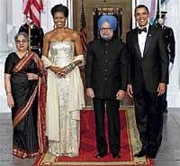 Special Guests: US President Barack Obama and First Lady Michelle Obama with Prime Minister Manmohan Singh and  wife Gursharan Kaur at the North Portico of the White House on Monday. AFP