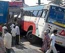 ill-fated The bus which was hit by a truck on Mysore Road at Bapuji Nagar on Friday. DH photo