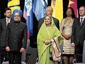 Prime Minister Manmonah Singh and his Bangladeshi counterpart Sheihk Hasina attend the opening ceremony of the Commonwealth Heads of Government Meeting in Port of Spain, Trinidad and Tobago, on Friday. AFP