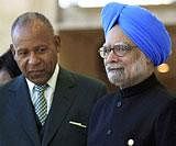 Prime Minister Manmohan Singh with Trinidad and Tobago Prime Minister Patrick Manning at the opening ceremony of the Commonwealth Heads of Government meeting (CHOGM) in Port-of-Spain, Trinidad, on Friday. PTI