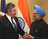 Prime Minister Manmohan Singh with his British counterpart Gordon Brown at the opening ceremony of the Commonwealth Heads of Government meeting (CHOGM) in port of Spain on Friday. PTI