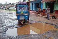 State highway between Koodige-Shirangala in Kushalnagar in a deplorable condition. DH Photo
