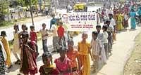 Early Starters: Children taking out a rally in Kolar on Sunday to mark Adima Shakti Childrens meet. DH Photo