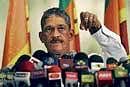 Former chief of the Sri Lankan army Sarath Fonseka  addresses a media conference in Colombo on Sunday. AP