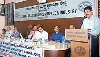 FKCCI President J Crasta addressing the members of KCCI in Mangalore on Monday. DH photo