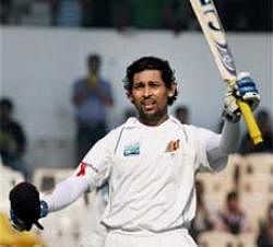 Sri Lankan batsman Tilakratne Dilshan  completes a century on the opening day of the third and final test between India and Sri Lanka at the Brabourne Stadium, Mumbai on Wednesday. PTI