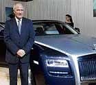 Rolls-Royce Asia Pacific Regional Director Colin Kelly poses with the Rolls-Royce Ghost in Mumbai on Friday. PTI