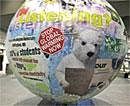 A globe is displayed in a subway station in Copenhagen, Denmark on Sunday , one day before the start of Climate Summit. AP