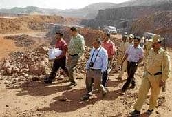 Indian Bureau of Mines Deputy Controller M S Waghmare, Goa Regional  Controller A B Panigrahi and local officials conducting investigations at the RBSSN mining area in Hospet on Monday. DH photo